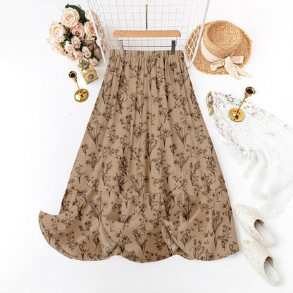 Jupe midi à imprimé floral avec taille élastique et volant fluide